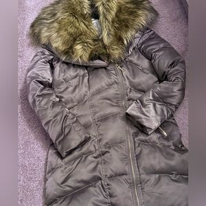 Jennifer Lopez puffer coat with detachable fur collar